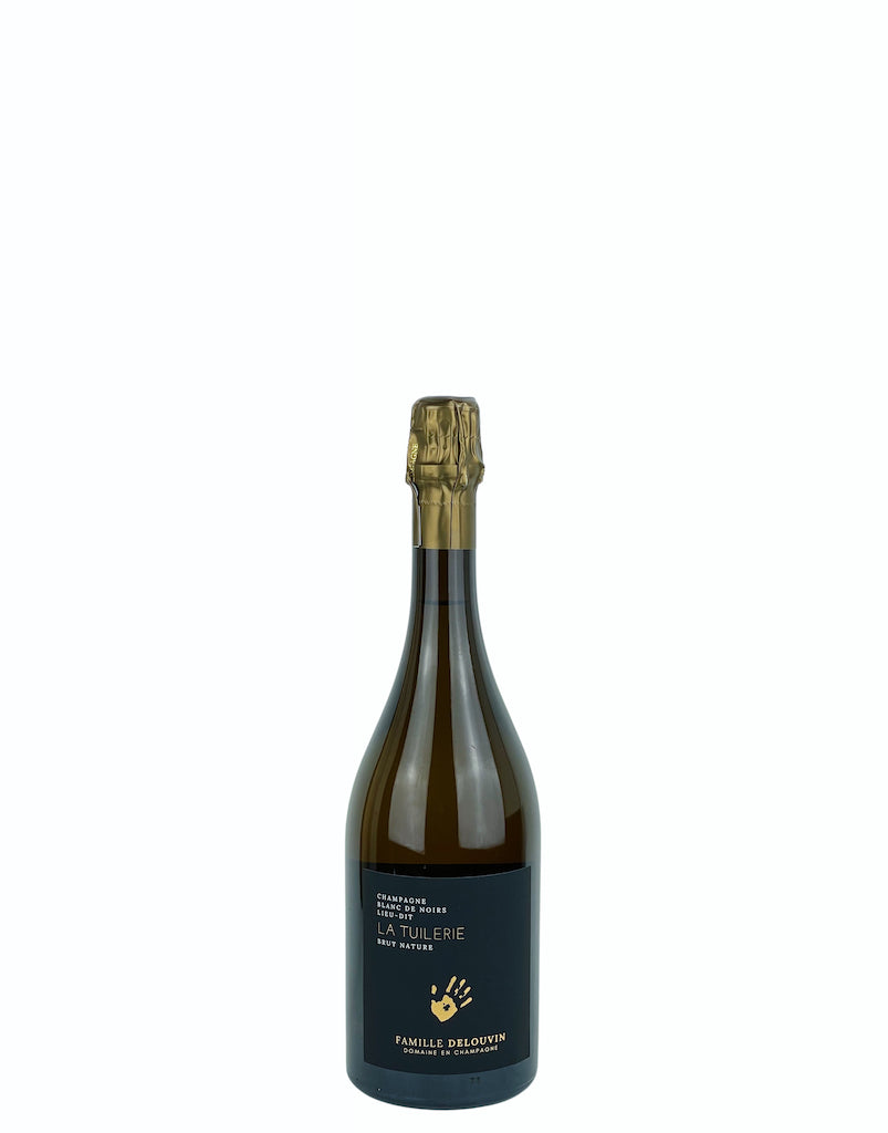 A bottle of La Tuilerie, a Champagne produce by Family Delouvin with Pinot Meunier grapes. 